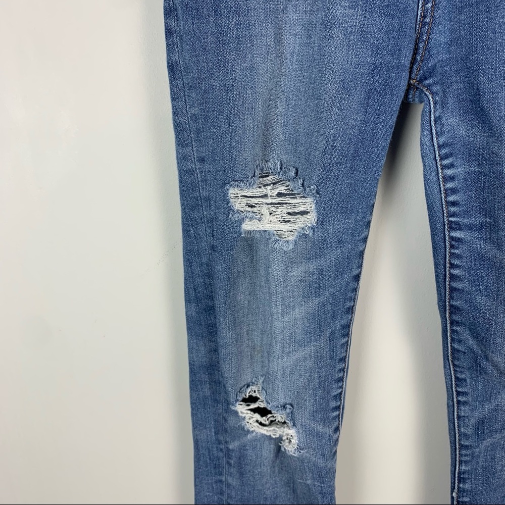 American Eagle Highest Rise Super Stretch X Distressed Raw Hem Jeggings - Picture 4 of 8